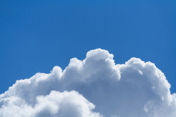 Fototapeta na wymiar Fluffy clouds in the blue sky with copy space