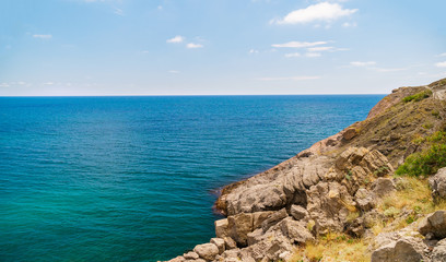 Sea aerial view, Top view, amazing nature background.The color of the water and beautifully bright. Azure beach with rocky mountains and clear water of Crimea at sunny day.