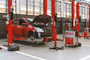 car repair station with soft-focus and over light in the background