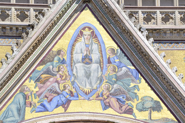 Detail of the facade of the cathedral of Orvieto, Umbria, Italy. Polychrome mosaic
