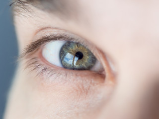 Male eye, close-up. Healthy vision. Look ahead.