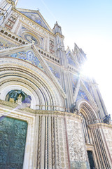 Facade of the Cathedral of Orvieto (Duomo di Orvieto) Italy. Construction in Gothic style dedicated...
