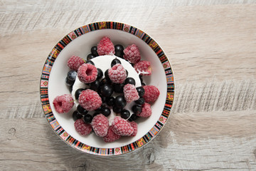 Tasty and delicious ice cream with berries