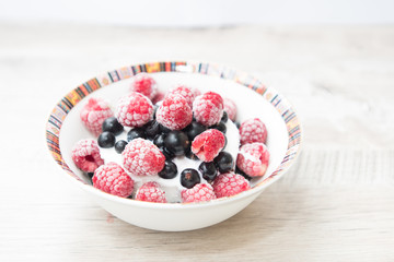 Tasty and delicious ice cream with berries