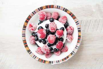 Tasty and delicious ice cream with berries