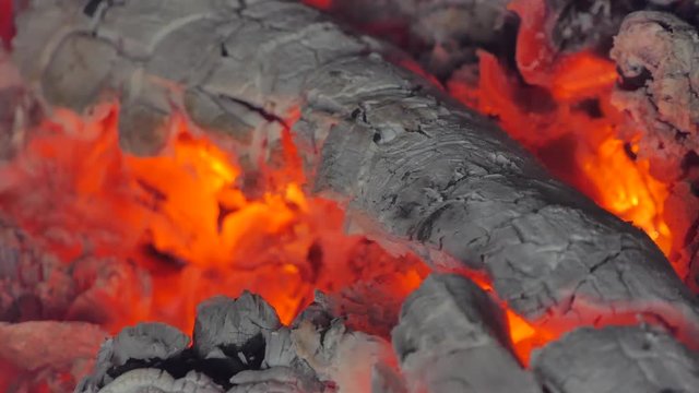 Close up of glowing flame from charcoal and firewood in kiln. abstract backgrounds