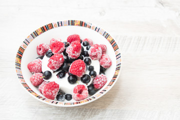 Tasty and delicious ice cream with berries