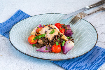 Chicken and cherry tomatoes bake with puy lentils