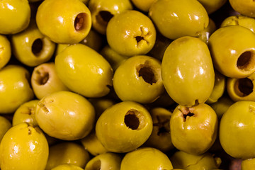 Background of the fresh marinated green olives