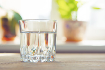 a glass of water on a table