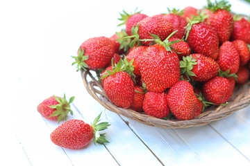 Strawberry on rustic wooden background