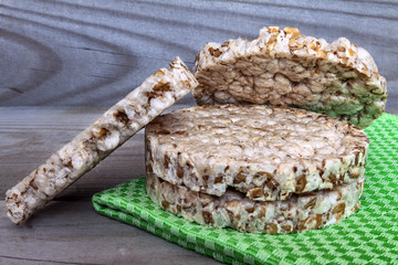 Stack of crispbreads on dark wooden table