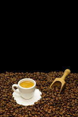 Hot coffee espresso with coffee beans
