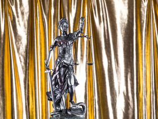 the concept of law, the bronze statue of Themis, the symbol of justice, the office of lawyers