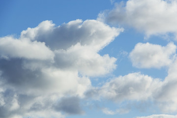 cloudy sky. Cumulus clouds in the blue sky.