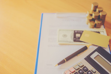 Lease / Rental agreement document with keys and pen. Highlighted text