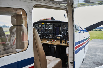 Detailed view of Cessna 172 Skyhawk 2 airplane interior standing on a runway.
