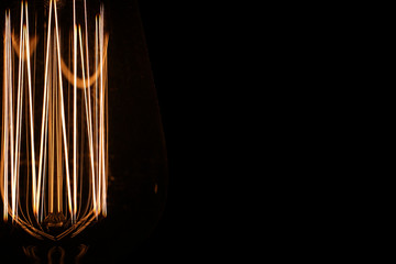 Fototapeta na wymiar Lamps with tungsten filament. Edison's light bulb. Filament fila