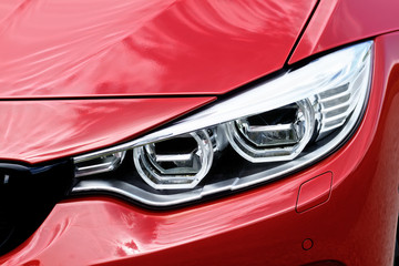 Red sports car headlight