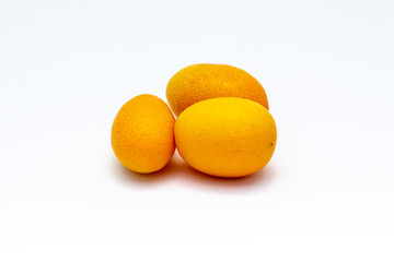 Granada, Spain; July 01, 2018: Three chinese oranges on a white background