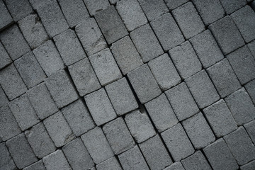 Stack of gray construction bricks