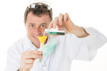 male chemist holds test tube of glass in his hand overflows a liquid solution