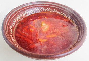 Ukrainian borsch in national dishes. Candid.