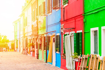 Colorful houses in Burano island with sunlight near Venice, Italy. Popular and famous tourist place