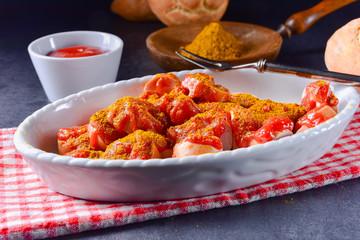 a traditional currywurst in delicious curry sauce