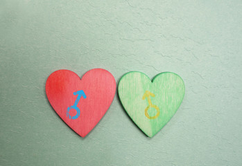 Obraz premium Red and green same sex hearts