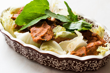 Turkish Food Cig Kofte with lettuce and Rocket Leaves or Arugula