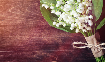 Bouquet of lilies of the valley on a table