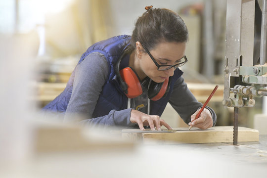 Woman in professional training, wood industry
