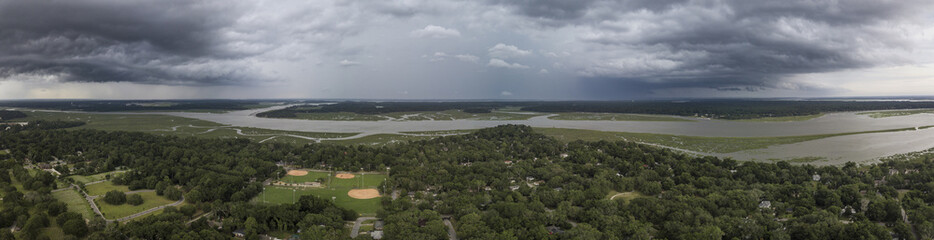 Aerial 180 degree panorama of storm front moving though South Carolina, USA.