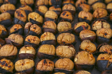  Fried chestnuts on the street. Street food. Roasted chestnuts