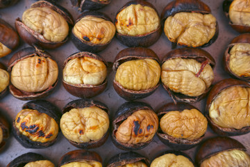  Fried chestnuts on the street. Street food. Roasted chestnuts