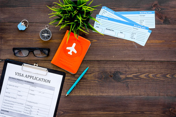 Prepare to trip. Do visa. Airplane tickets near passport cover with airplane silhouette, visa...