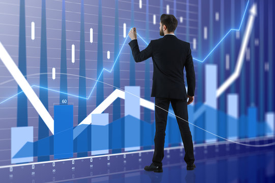 businessman and stock market chart