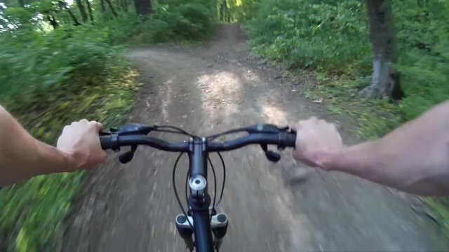 Mountain biking in a forest. POV Original point of View Ukraine Khmelnytskyi 2