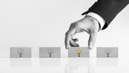 Businessman hand picking up ideas
