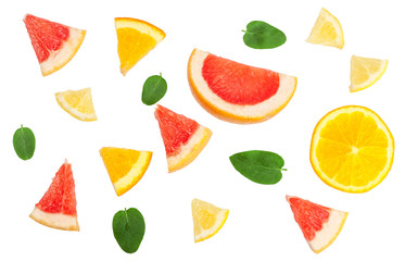Sliced pieces of grapefruit, orange, lemon isolated on white, top view.
