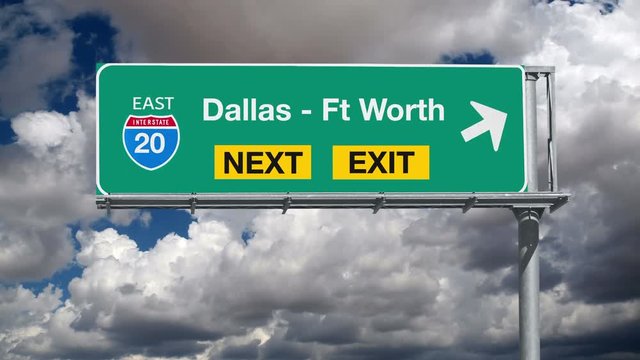 Dallas - Ft Worth Texas Freeway Exit Sign with Time Lapse Clouds