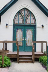 Fototapeta na wymiar The doorway of a church in a small town.