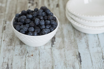 Fototapeta na wymiar Homemade small individual blueberry pies with fresh summer blueberries
