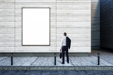 businessman and blank billboard