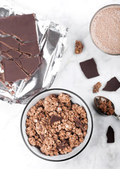 Bowl with organic chocolate granola breakfast