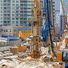 Excavator, tractor, machine for drilling wells technique for building a house.