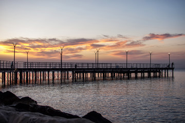 Fototapeta premium View of the colonnade along the sea at sunrise, Limassol, Cyprus