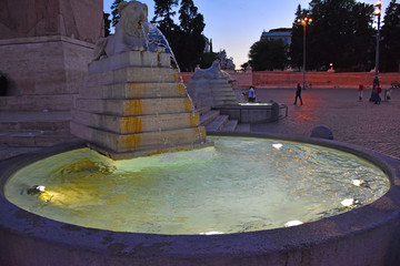 Rome,  fountain of the lions in Piazza of Popolo.