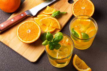 Obraz na płótnie Canvas Glass of fresh orange juice with fresh fruits